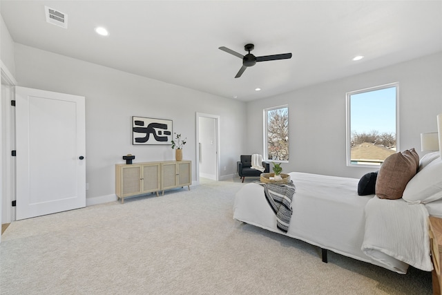 carpeted bedroom with ceiling fan