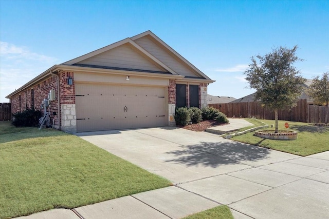 ranch-style house with a garage and a front yard