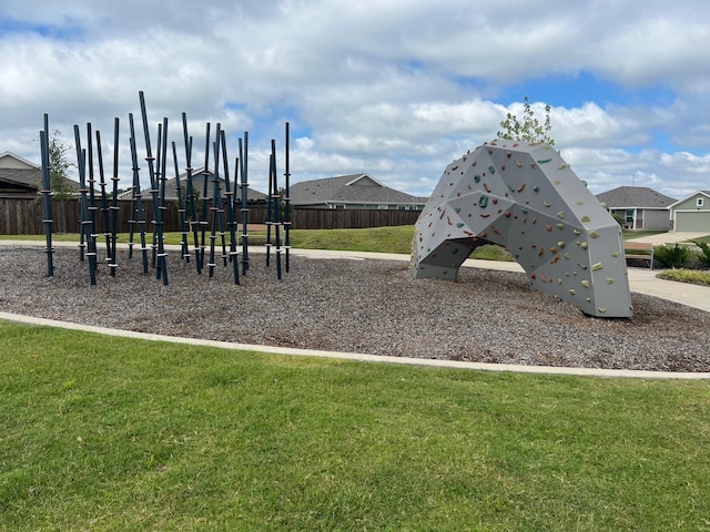 view of playground with a yard