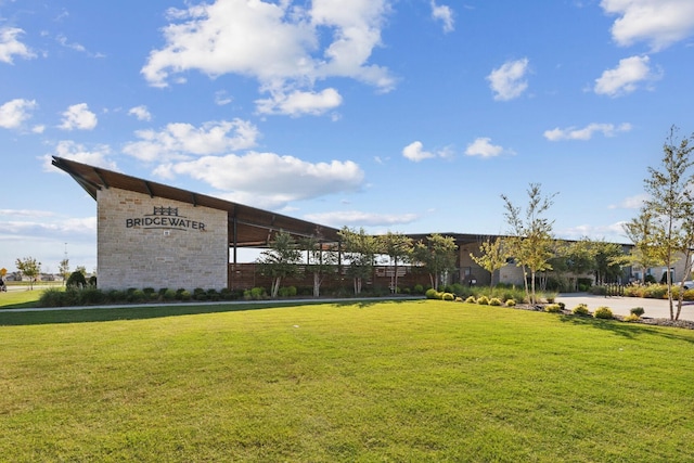 view of community featuring a yard