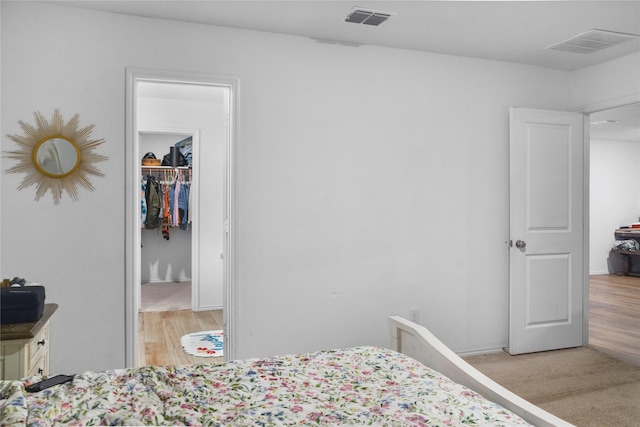 5405 Lavender Dr, Princeton, TX 75407 - bedroom with a spacious closet, a closet, and light wood-style floors