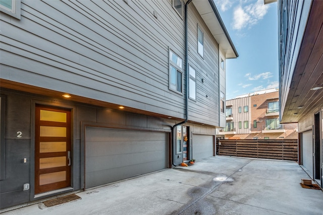 view of side of property featuring a garage