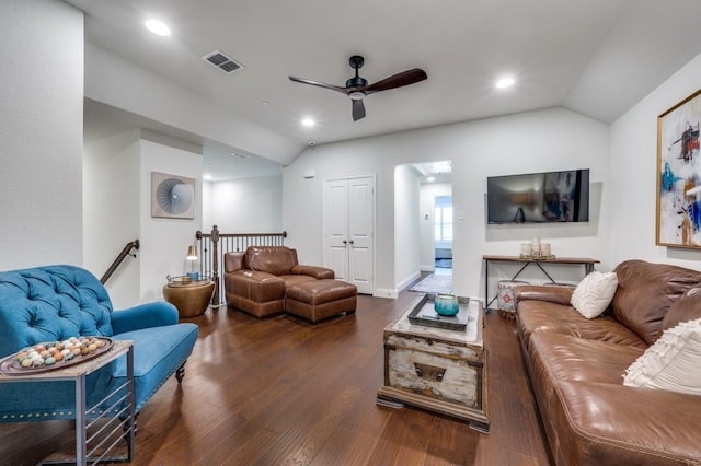 living room with dark wood-type flooring, lofted ceiling, and ceiling fan