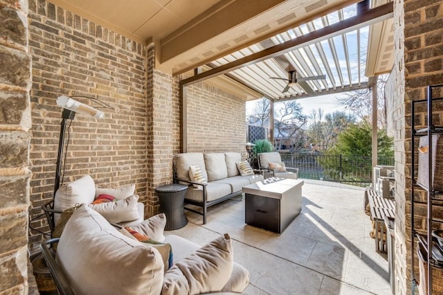 view of patio / terrace with an outdoor hangout area, ceiling fan, and a pergola