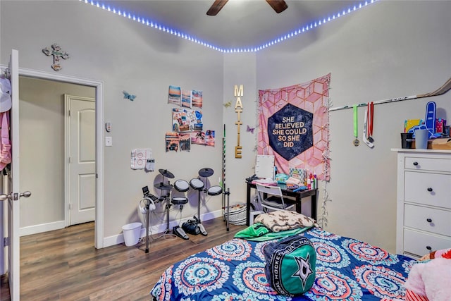 bedroom featuring ceiling fan and dark hardwood / wood-style flooring