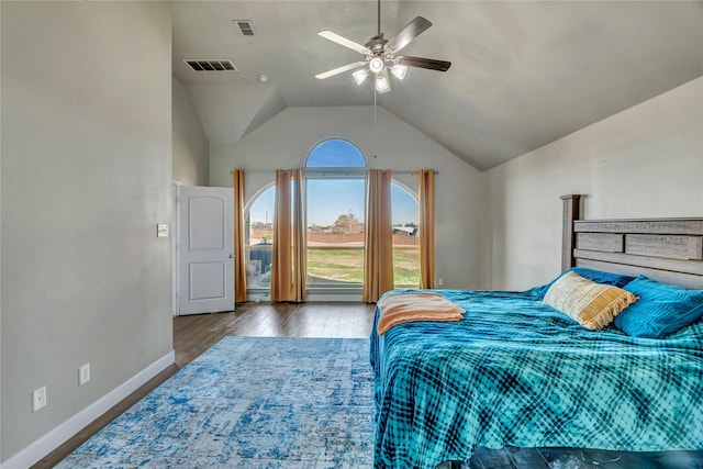 bedroom with vaulted ceiling, ceiling fan, and wood-type flooring