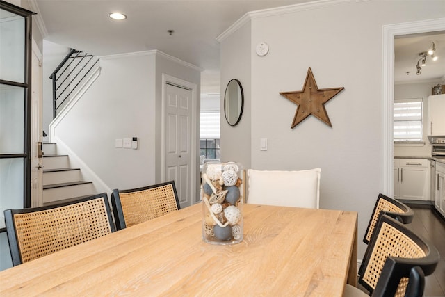 dining room featuring ornamental molding