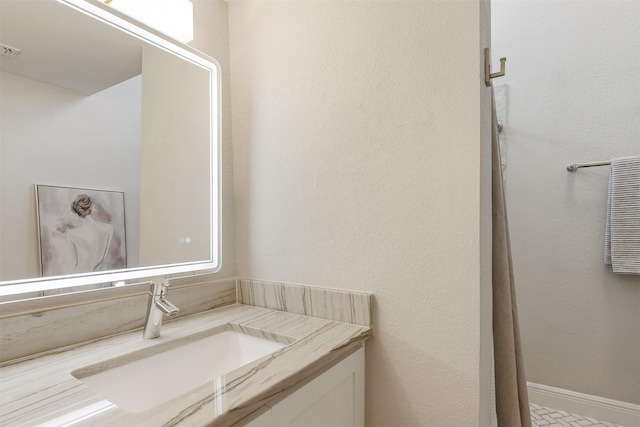 bathroom featuring vanity