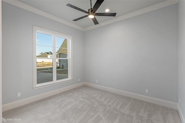 unfurnished room with light carpet, ceiling fan, and baseboards