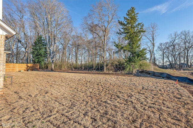 view of yard with fence