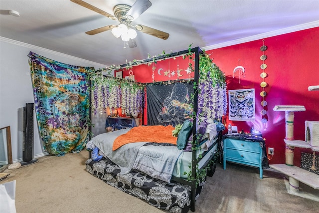 carpeted bedroom with ceiling fan and crown molding