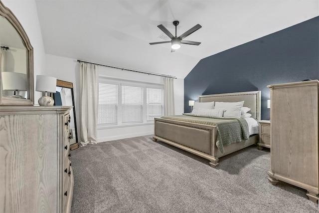 carpeted bedroom featuring lofted ceiling and ceiling fan