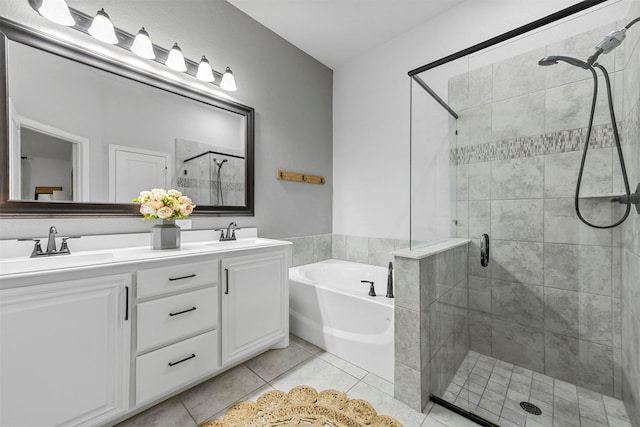 bathroom with vanity, shower with separate bathtub, and tile patterned flooring