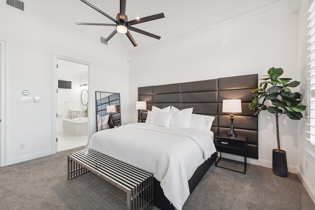 bedroom featuring connected bathroom, carpet flooring, vaulted ceiling, ceiling fan, and crown molding