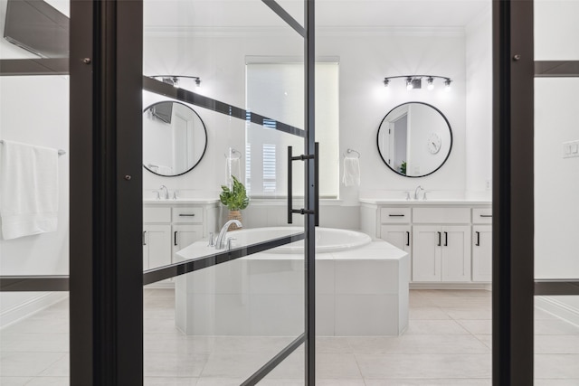 bathroom featuring vanity, tile patterned flooring, a relaxing tiled tub, and ornamental molding