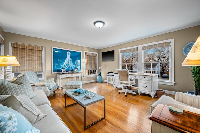 living room featuring crown molding and light wood-type flooring