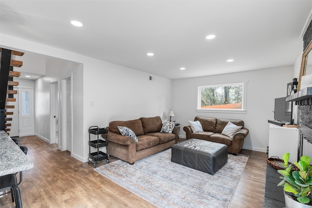 living room with hardwood / wood-style flooring