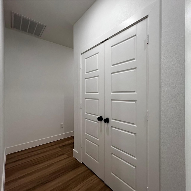 interior space with dark hardwood / wood-style flooring