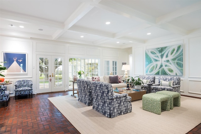 living room featuring coffered ceiling, french doors, and beamed ceiling