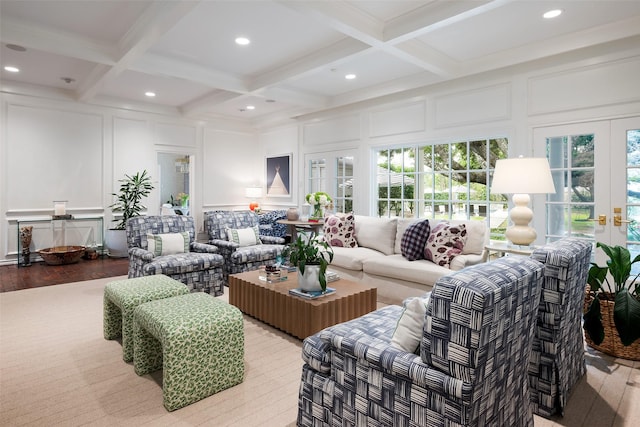 living room with hardwood / wood-style floors, coffered ceiling, and beamed ceiling