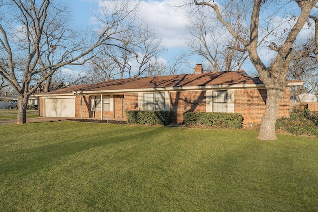 single story home with a garage and a front yard