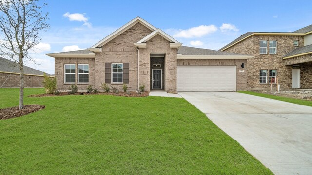 740 Vineyard Way, Forney, TX 75126 - view of front facade featuring a garage and a front lawn
