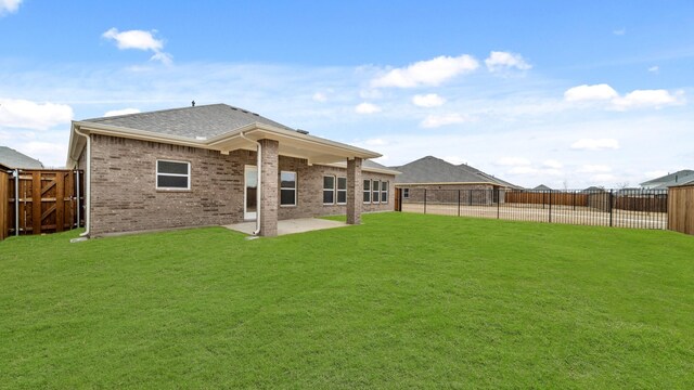 740 Vineyard Way, Forney, TX 75126 - rear view of property with a yard and a patio