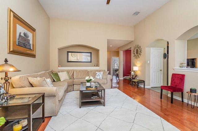 living room with light hardwood / wood-style flooring