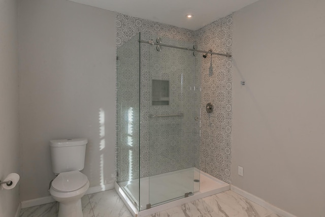 bathroom with toilet and walk in shower