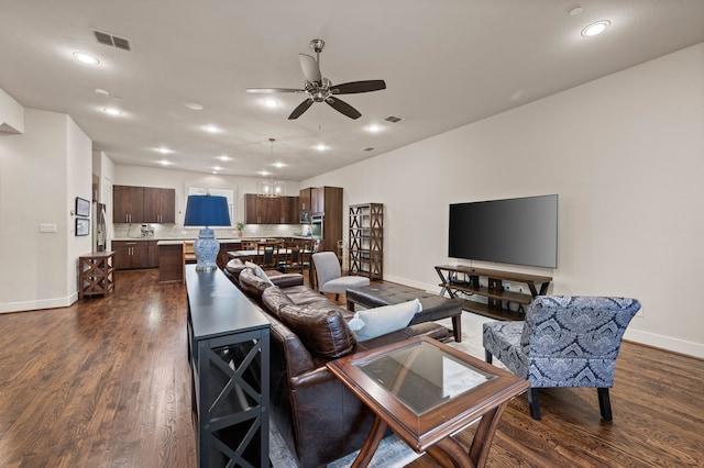 4211 Rawlins St Unit 733, Dallas, TX 75219 - living room featuring ceiling fan, baseboards, recessed lighting, and dark wood-style flooring