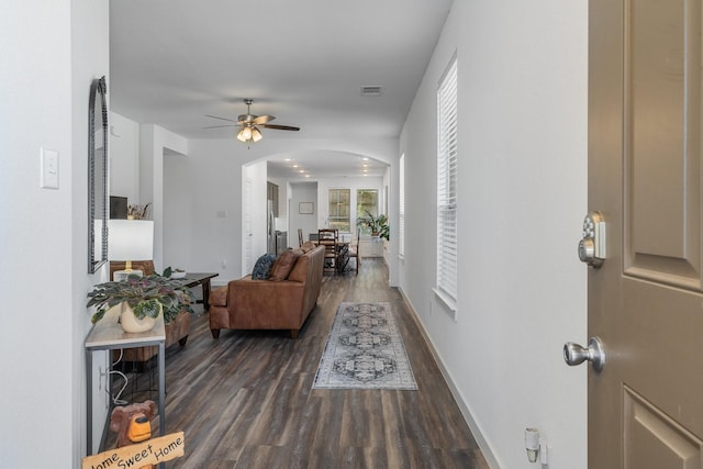 hallway with dark wood-type flooring