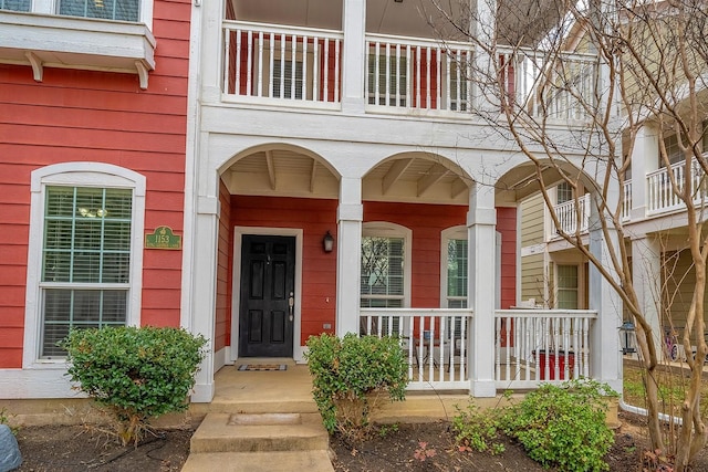 doorway to property with a porch