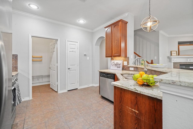 kitchen with ornamental molding, stainless steel dishwasher, hanging light fixtures, and light stone countertops