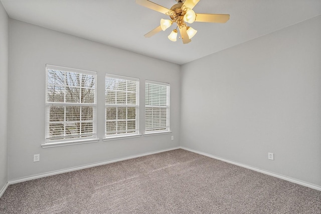 carpeted empty room with ceiling fan