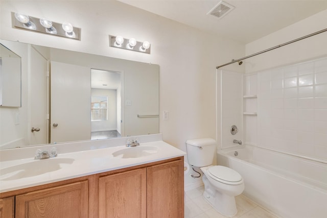 full bathroom featuring washtub / shower combination, toilet, tile patterned flooring, and vanity