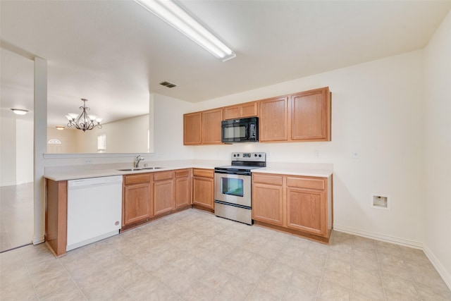 kitchen featuring dishwasher, decorative light fixtures, sink, stainless steel electric range oven, and a notable chandelier