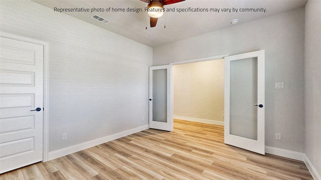 unfurnished bedroom featuring ceiling fan, light hardwood / wood-style flooring, and french doors