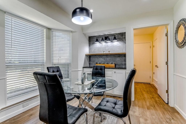 dining space featuring light hardwood / wood-style flooring