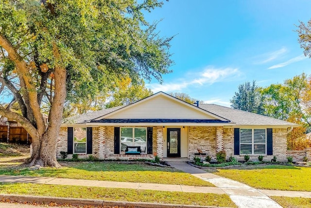 ranch-style home with a front yard