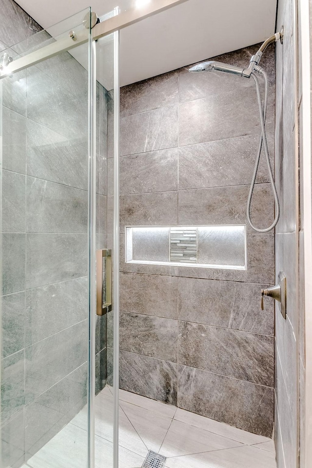 bathroom featuring an enclosed shower