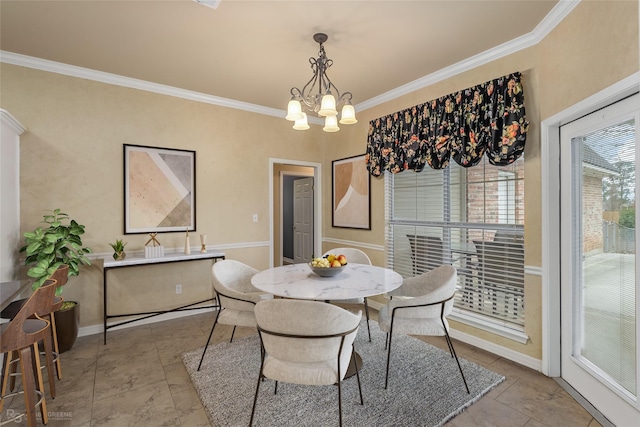 dining area with crown molding and a notable chandelier