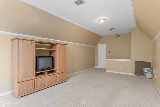 bonus room with light carpet and vaulted ceiling