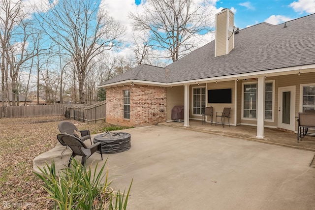 view of patio featuring area for grilling and a fire pit