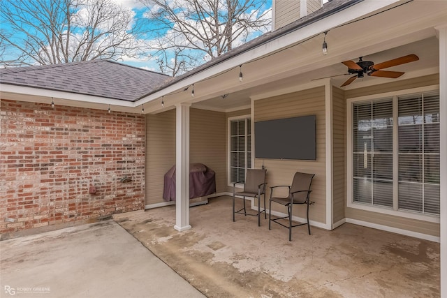 view of patio featuring grilling area and ceiling fan