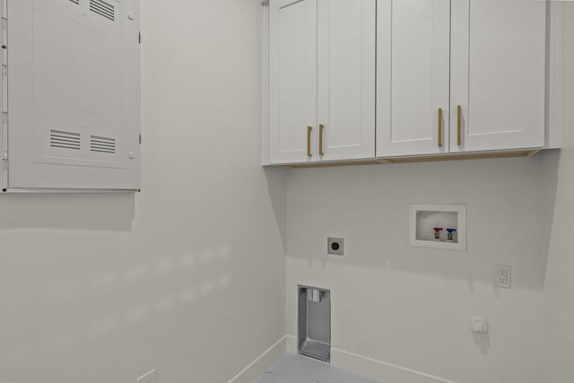 laundry room with washer hookup, cabinets, hookup for a gas dryer, and electric dryer hookup