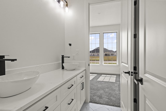 bathroom featuring vanity and tile patterned flooring