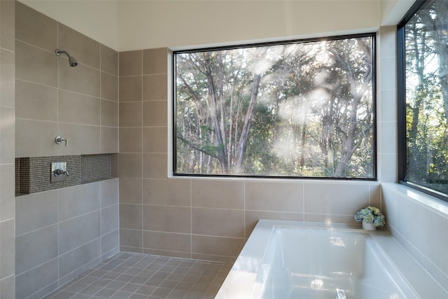 bathroom featuring a tub to relax in