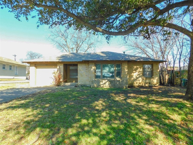 single story home with a front lawn and a garage