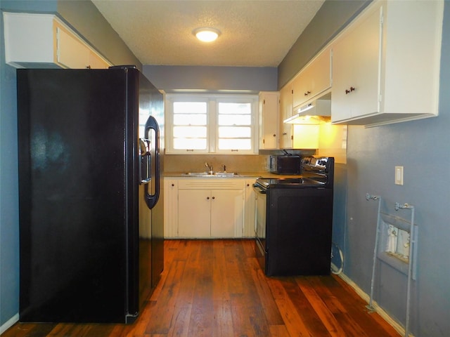 kitchen featuring white cabinetry, dark hardwood / wood-style flooring, a textured ceiling, black appliances, and sink