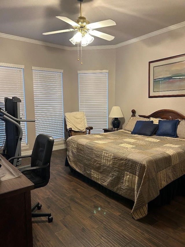 bedroom featuring ceiling fan, dark hardwood / wood-style flooring, and crown molding